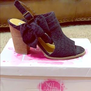 Size 9.5 black opened toe heels.